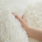 Tapis en peluche blanc doux